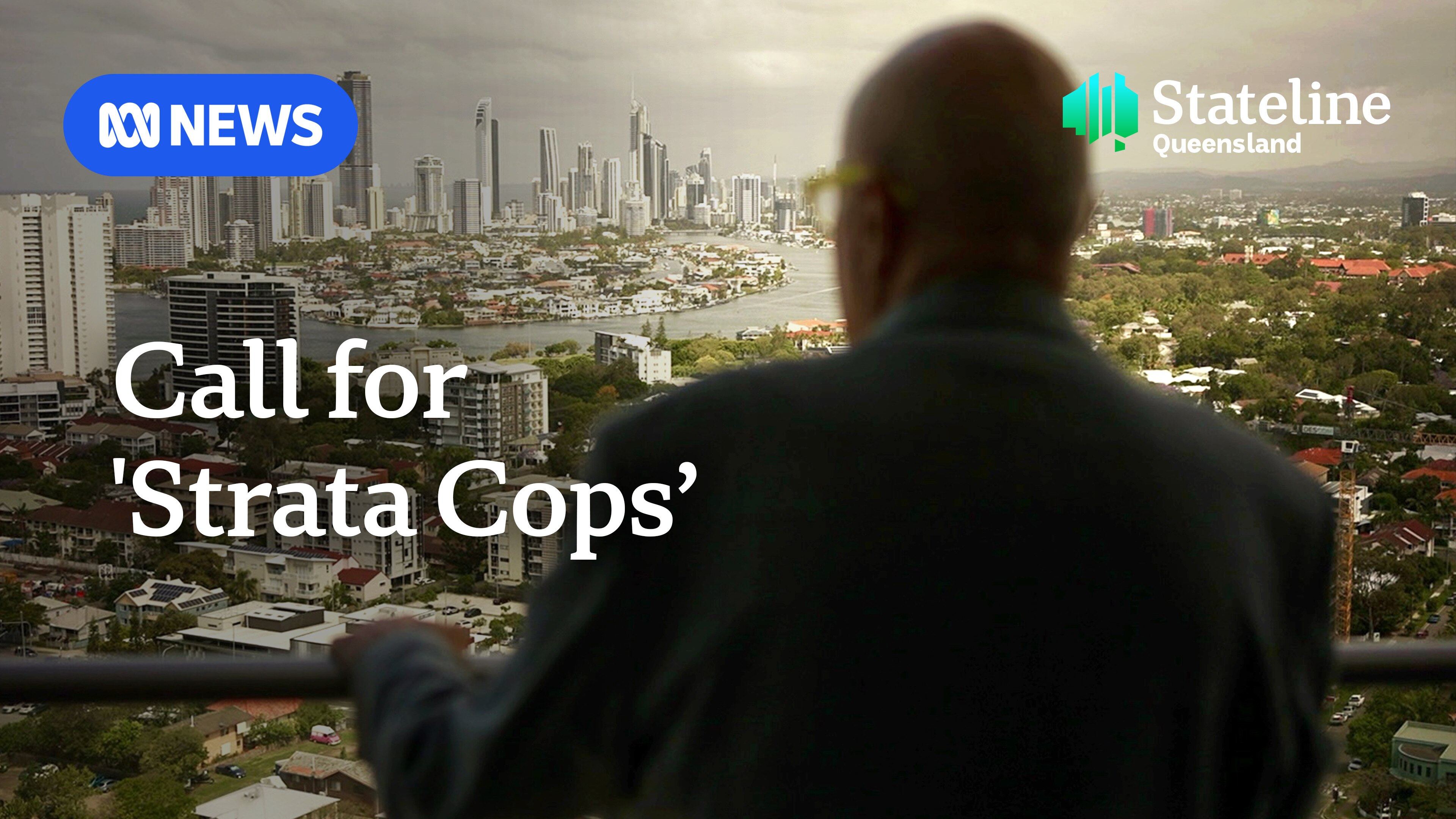 a man looking out from a balcony