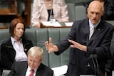 Environment Minister Peter Garrett defends his performance in his department's home insulation scheme as Prime Minister Kevin...