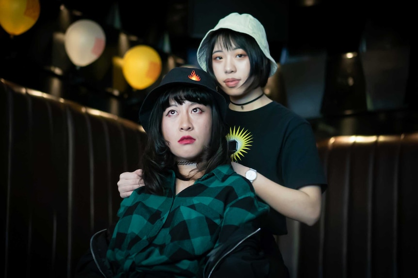 At a karaoke bar in Sydney, Viola Yao and Sophie Lin escape study for a while to share their love of hip hop.