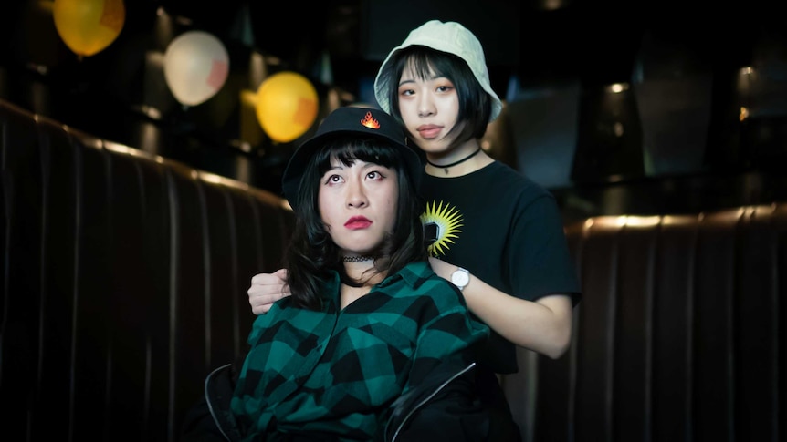 At a karaoke bar in Sydney, Viola Yao and Sophie Lin escape study for a while to share their love of hip hop.