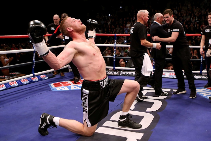 Come from behind victory ... Andrew Flintoff celebrates his win on debut.