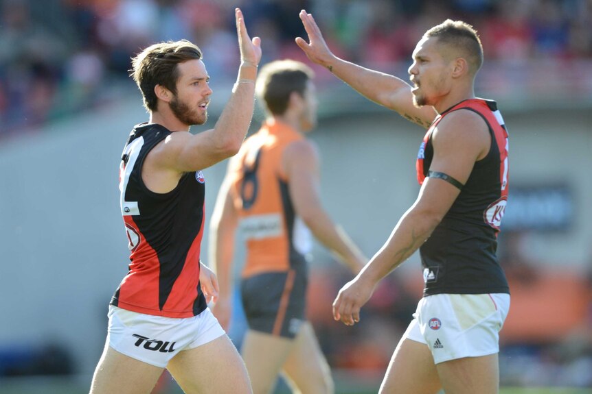Colyer and Jetta celebrate goal against Giants
