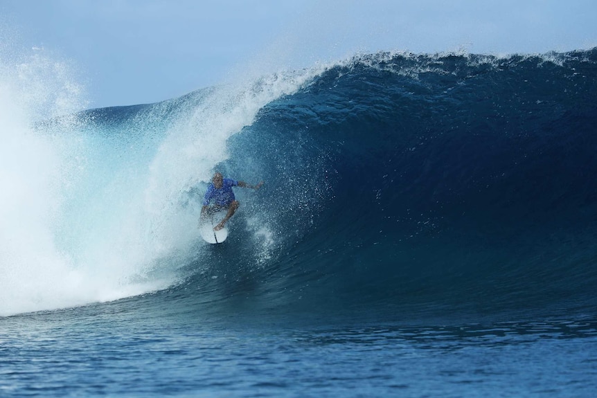Kelly Slater on his way to a nine point ride at the WSL event in Tahiti.