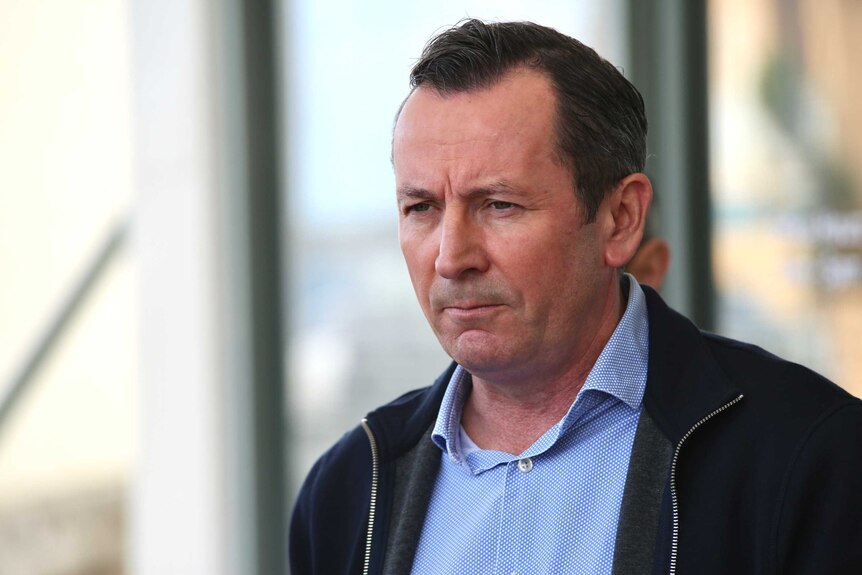 WA Premier Mark McGowan looking contemplative standing outside his office in Rockingham.