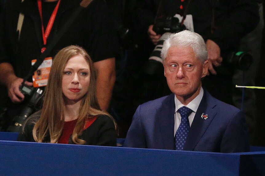 Chelsea Clinton, daughter of Hillary Clinton and former President Bill Clinton watch during the second presidential debate
