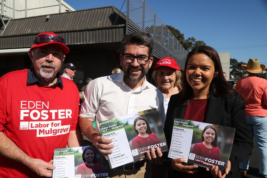 Labor candidate for the seat of Mulgrave Eden Foster at a prepolling booth with volunteers.
