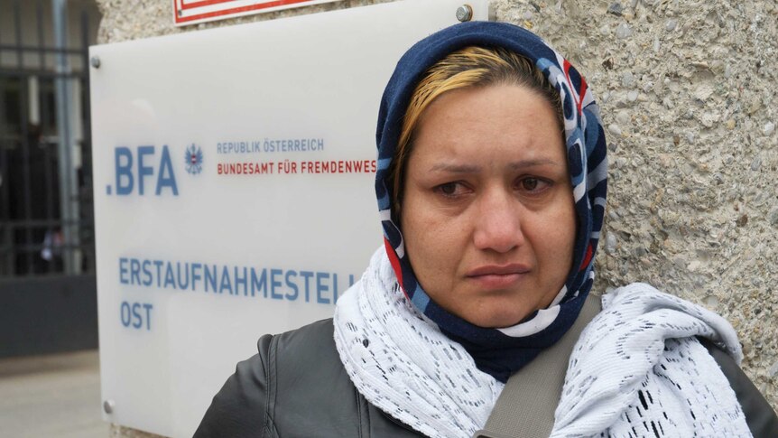 Farzona, 32, is from Afghanistan and has been stranded outside Traiskirchen's refugee reception camp in Austria for the past three days