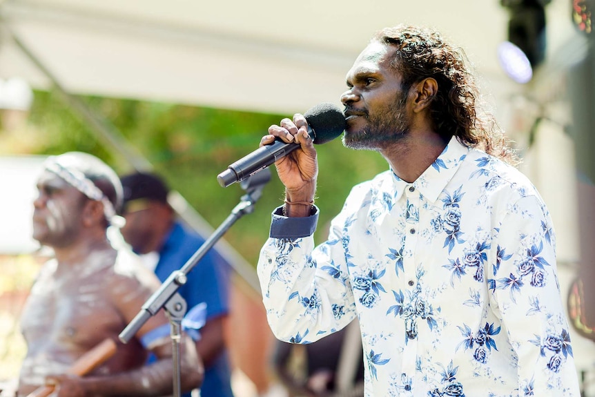 The lead singer of the Garrangali Band performing.