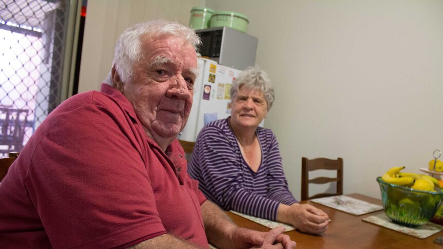 Former firefighter Peter Dance and his wife Helen in their kitchen at the Jack Tinetti Cottages in South Kalgoorlie.
