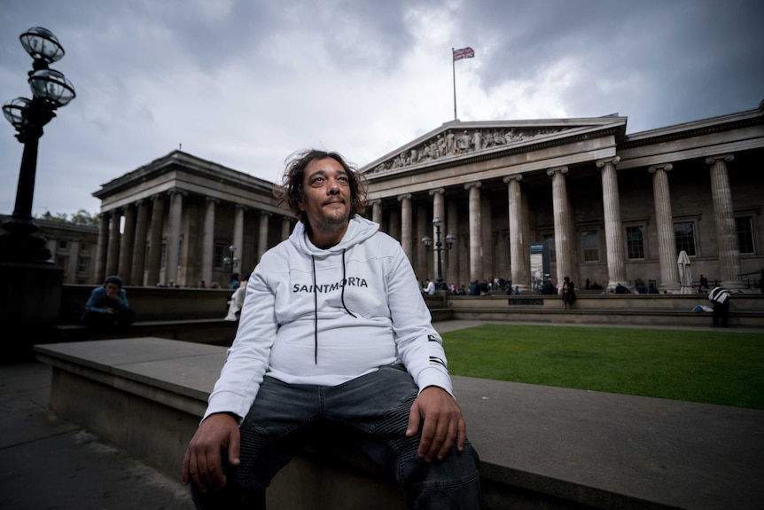 Rodney Kelly sits outside the British Museum in London.