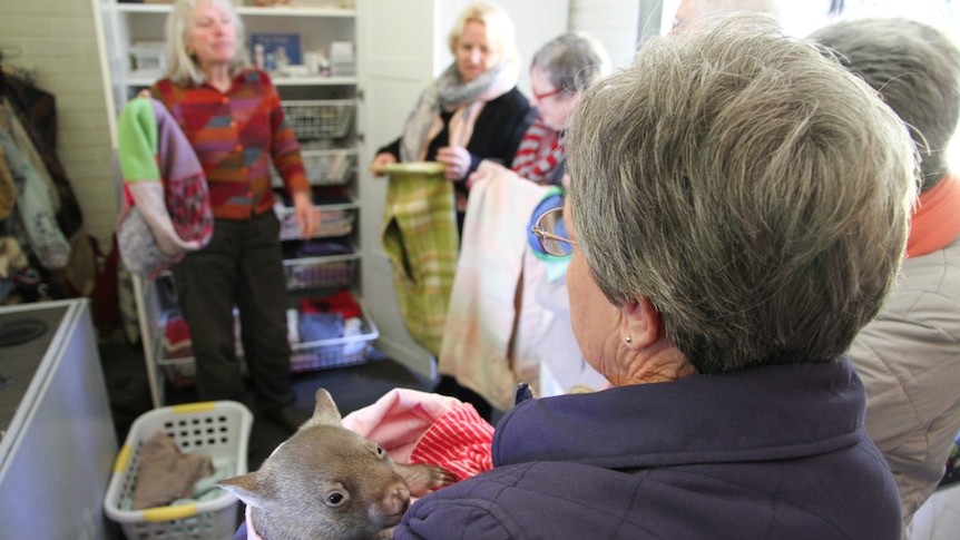 Ms Schweth demonstrates a variety of pouch designs for the ladies from Mossvale