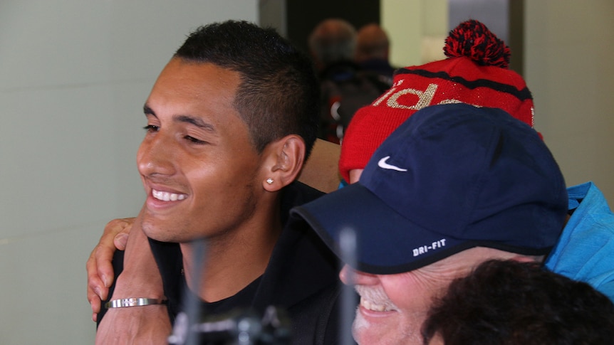 Nick Kyrgios arrives home at Canberra Airport after his impressive Wimbledon debut.