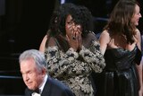 Joi McMillon of film Moonlight looks shocked during the Best Picture announcement at the Oscars.