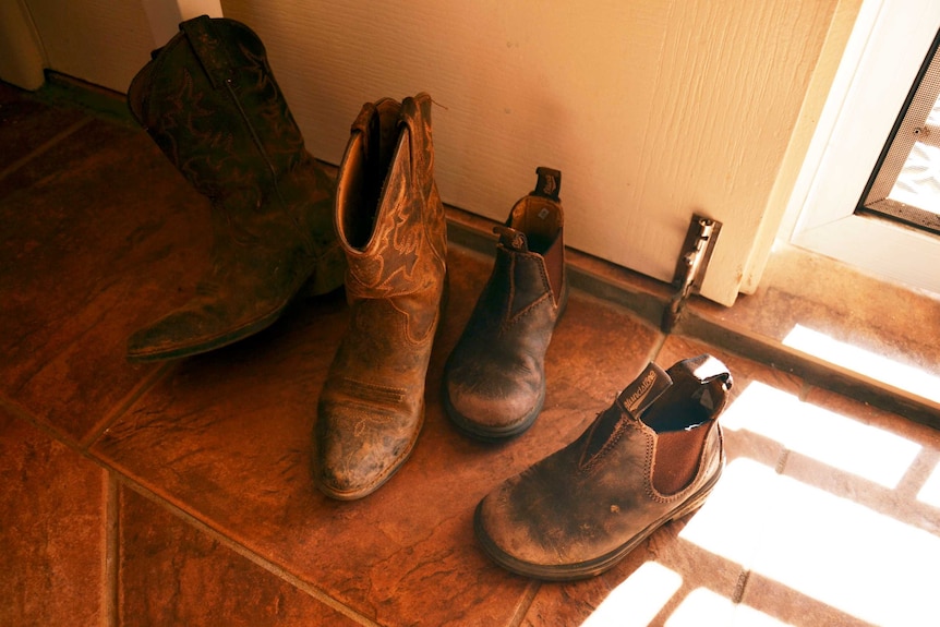 Boots in the doorway of the Swifts' home