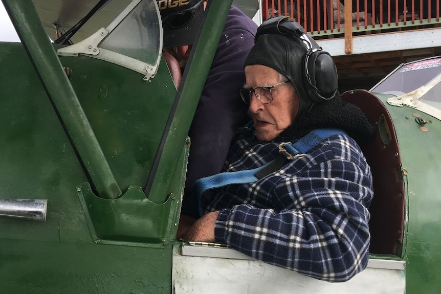 Elderly man in aircraft