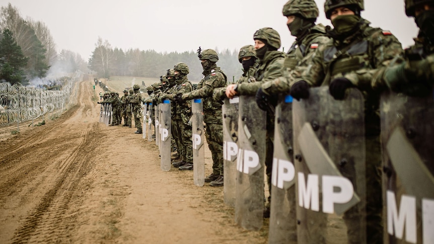 Polish soldiers guard the border with Belarus during migrant crisis