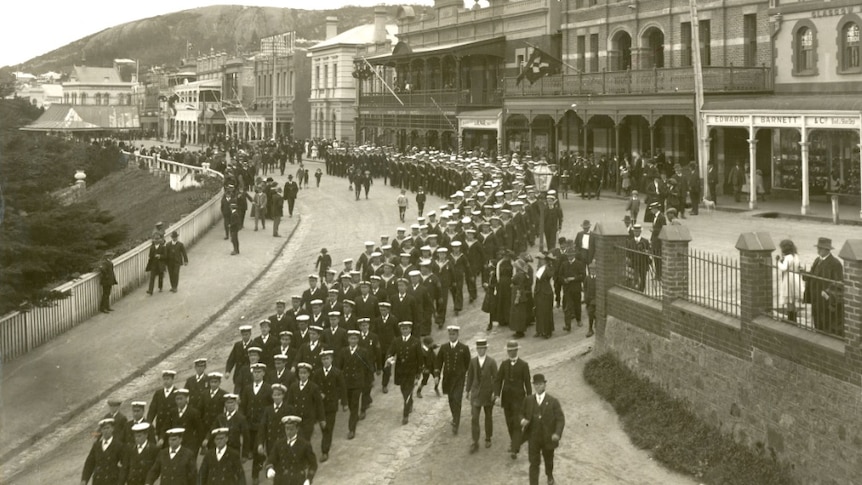 Sailors march in street