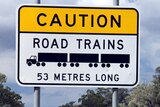 Road train sign by the side of an outback highway.