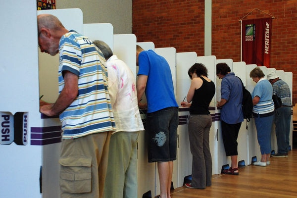 ACT voters fill in ballot forms at Ainslie Primary School, Canberra.