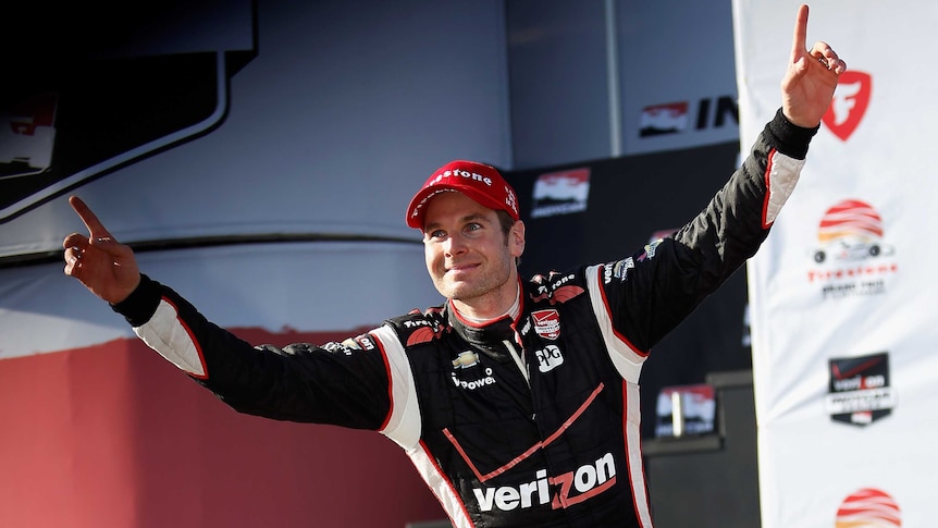 Australia's Will Power celebrates his win in the first race of the 2014 IndyCar season