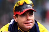 Cadel Evans takes part in a victory parade on theChamps-Elysees