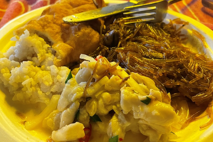 Plate of food with knife and fork