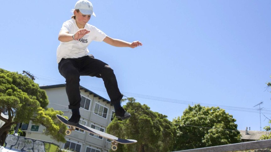 Young skateboarder and Olympic hopeful Liv Lovelace does a trick.