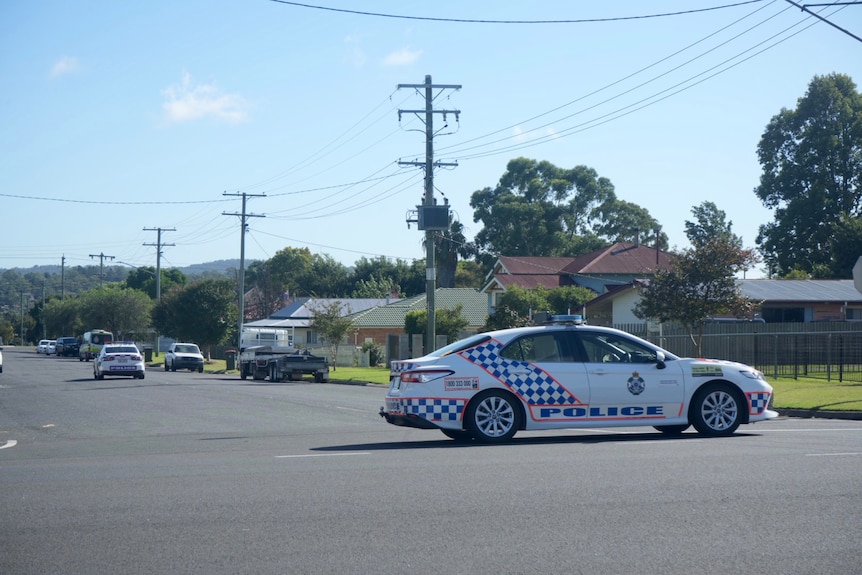 A police car in a street.