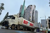 A truck with the slogan 'Keep the Sheep' moving through Perth's CBD.