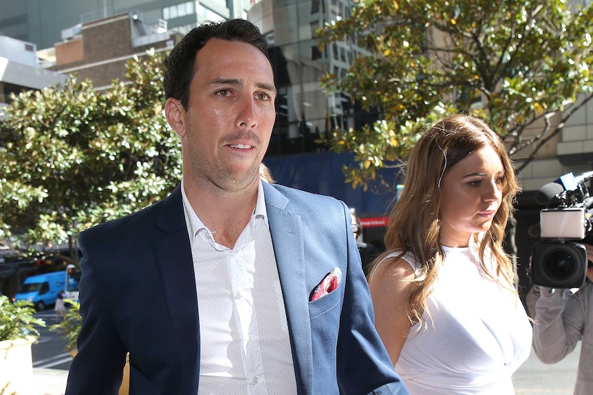 South Australian cricketer Tom Cooper arrives at the inquest into the death of Phillip Hughes in Sydney, October 2016