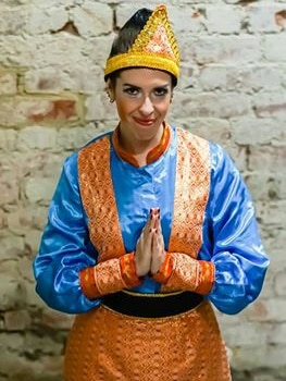 An Australian woman wearing a traditional dress of Aceh, Indonesia