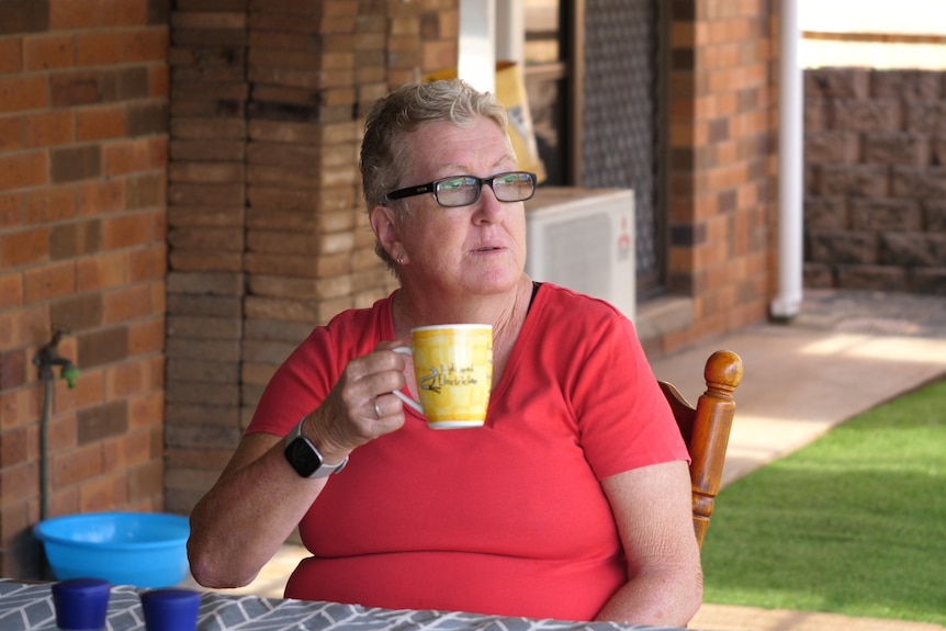 Margaret sipping a cup of tea.