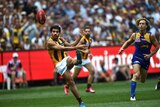 Cyril Rioli kicks Hawthorn's first goal against West Coast in the 2015 AFL grand final at the MCG.