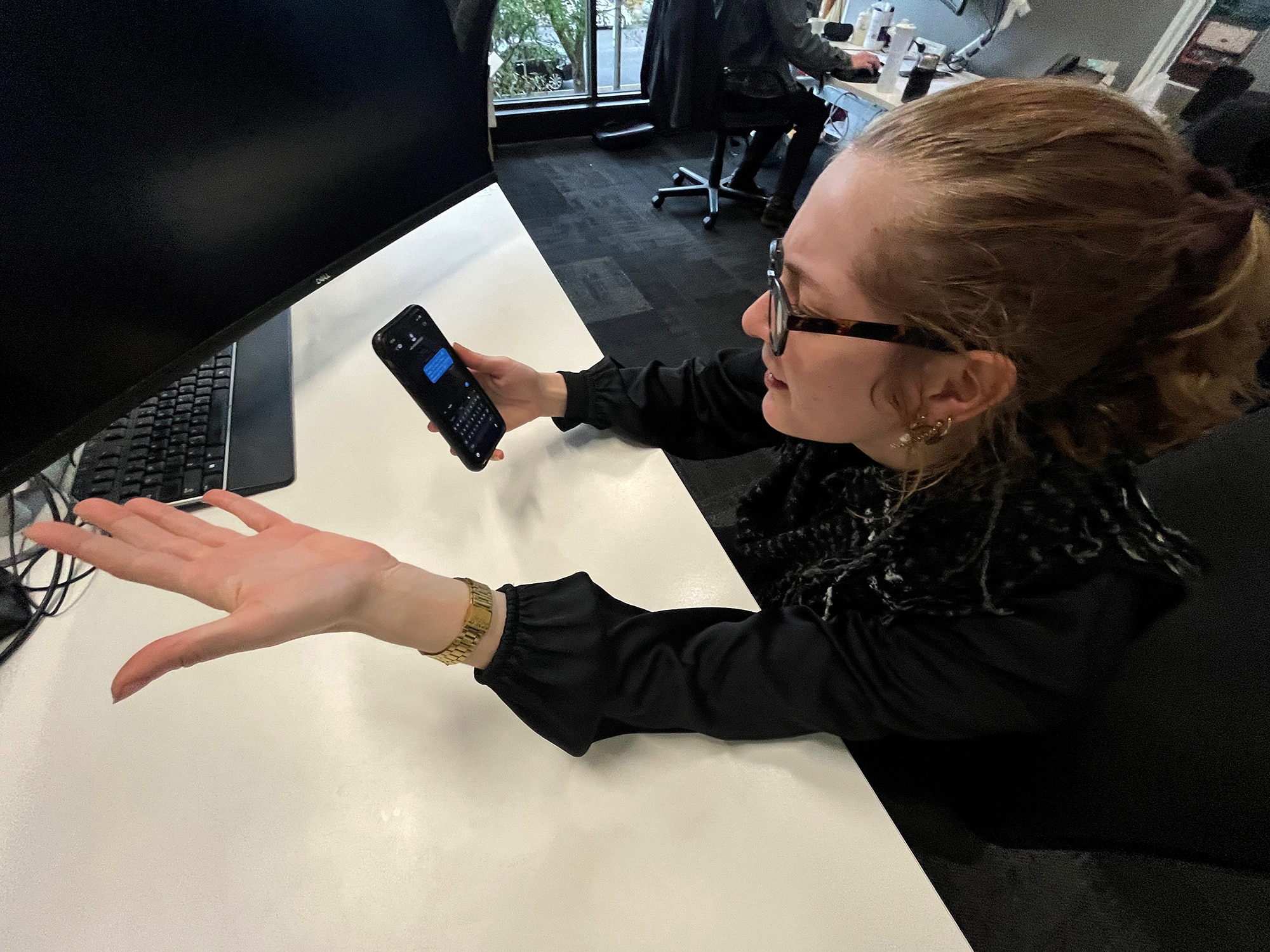 Young lady with looks frustrated with phone