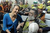 Kristina Keneally chats with miner