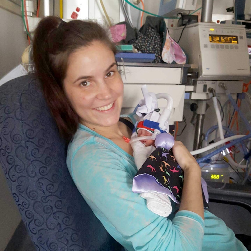 Bianca Rotar, of Melbourne, holding her premature daughter Lexi. S