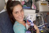 Bianca Rotar, of Melbourne, holding her premature daughter Lexi. S