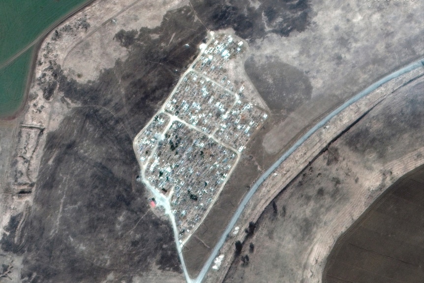 Satellite image shows shows a cemetery before.