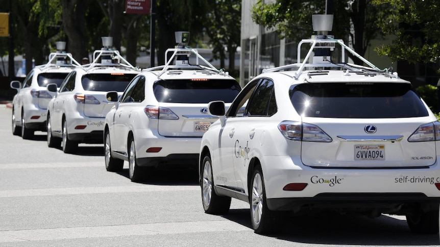 A row of Google self-driving Lexus's
