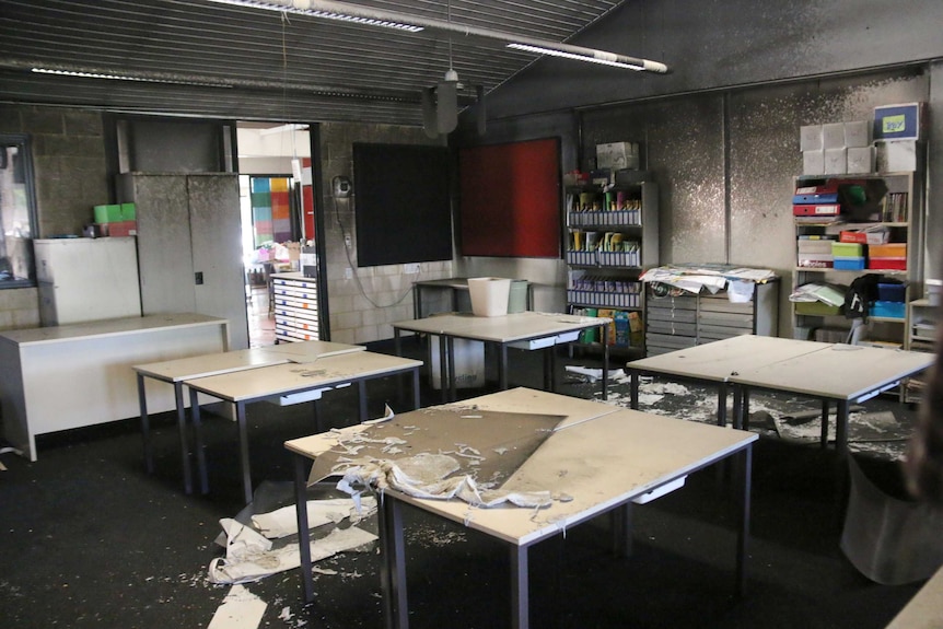 A fire-damaged classroom.