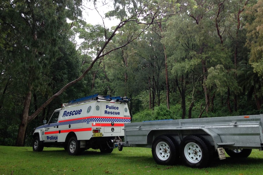Police Rescue vehicle at Austinmer plane search
