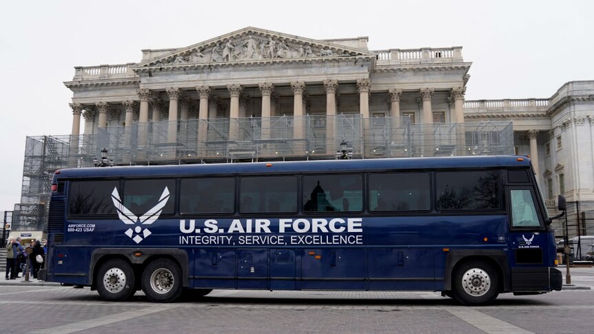 A US Air Force bus parked outside Capitol Hill
