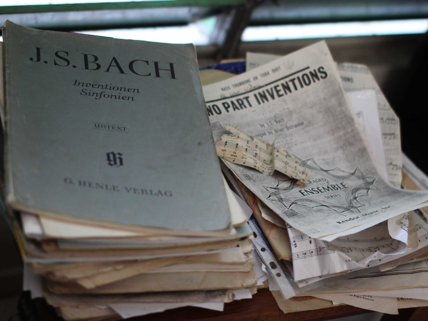 Stacks of old sheet music.