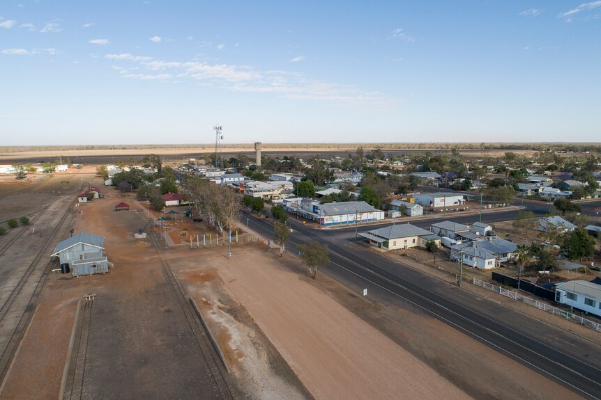 Aerial view of houses in a town in drought.