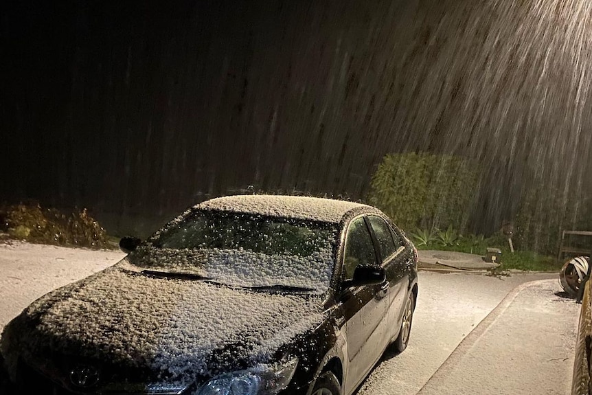 A car in the Adelaide Hills covered in ice.