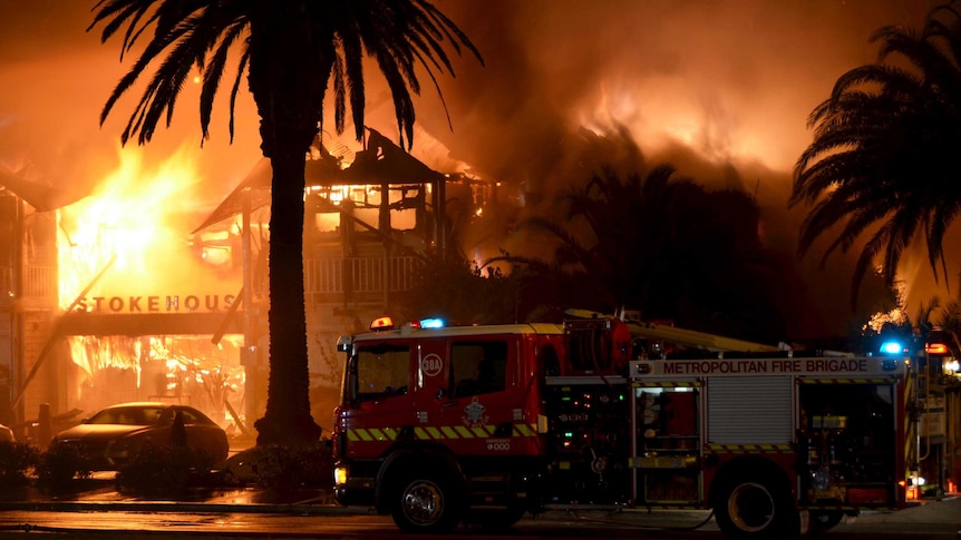 Flames pour from the Stokehouse restaurant at St Kilda.