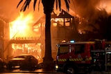 Flames pour from the Stokehouse restaurant at St Kilda.