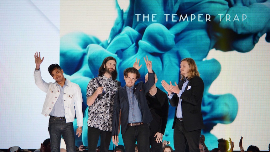 The Temper Trap accept the best group award at the 2012 ARIA Awards.