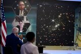 President Joe Biden listens during a briefing from NASA officials about the first images from the Webb Space Telescope.