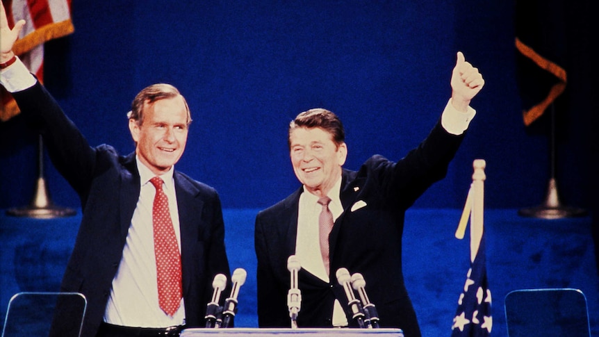 Ronald Reagan and George Bush celebrate on stage at the 1980 Republican convention.